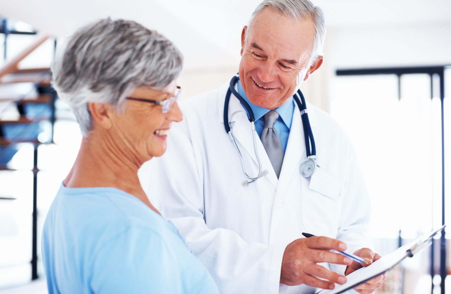 A clinician and patient sharing a warm moment