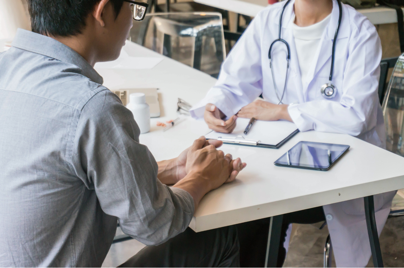 A clinician and patient in consultation